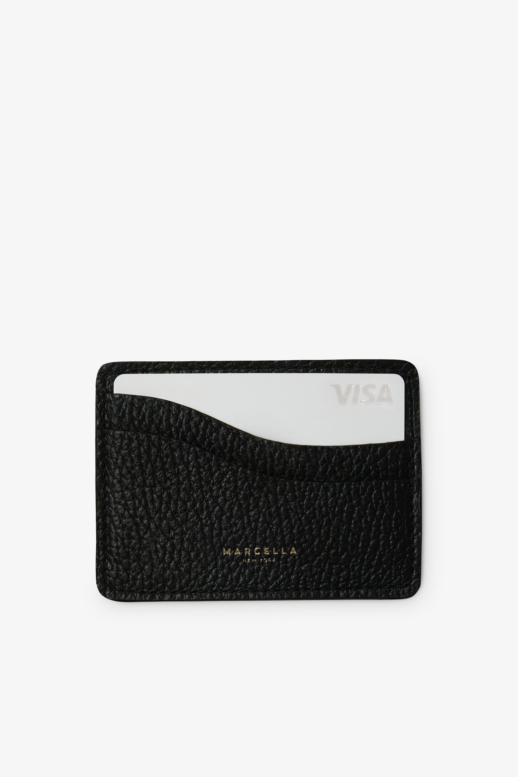 Black leather card holder with textured surface, single card slot, and gold "Marcella" branding, holding one white Visa card.