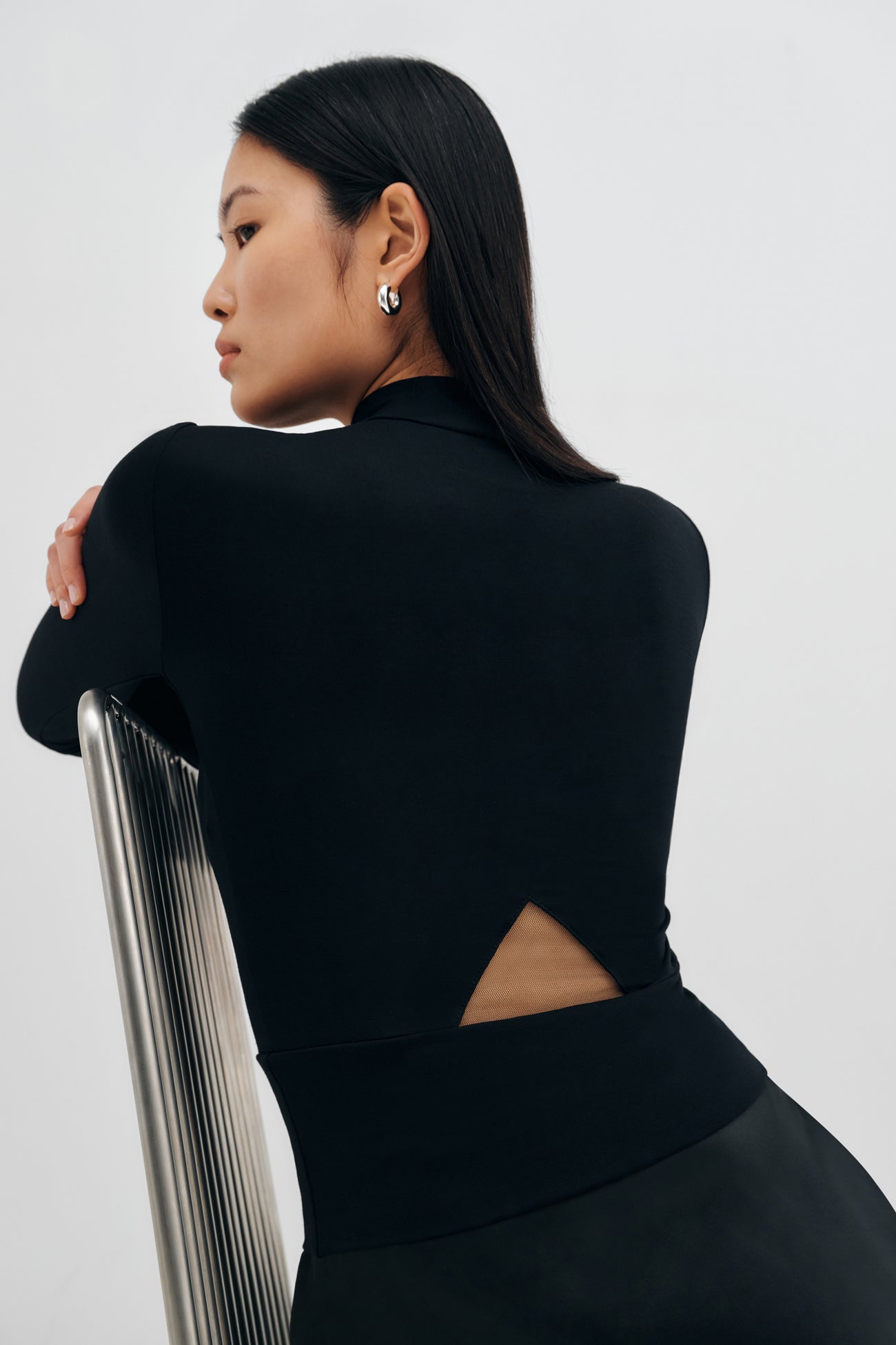 MARK & LONA MERCURY MOCK NECK TOPS　黒 Women's Black Mock Neck Top with Mesh Cutout | Marcella